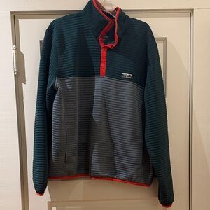 Green Pullover with Red Accents
